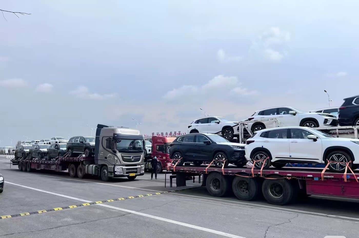 Car carrier convoy on the way to the port