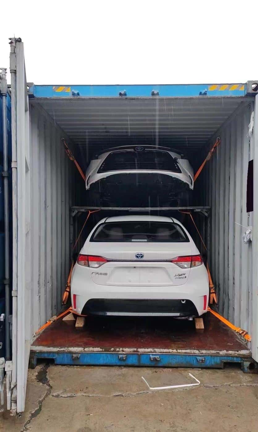 Two-tier racking with cars inside a container